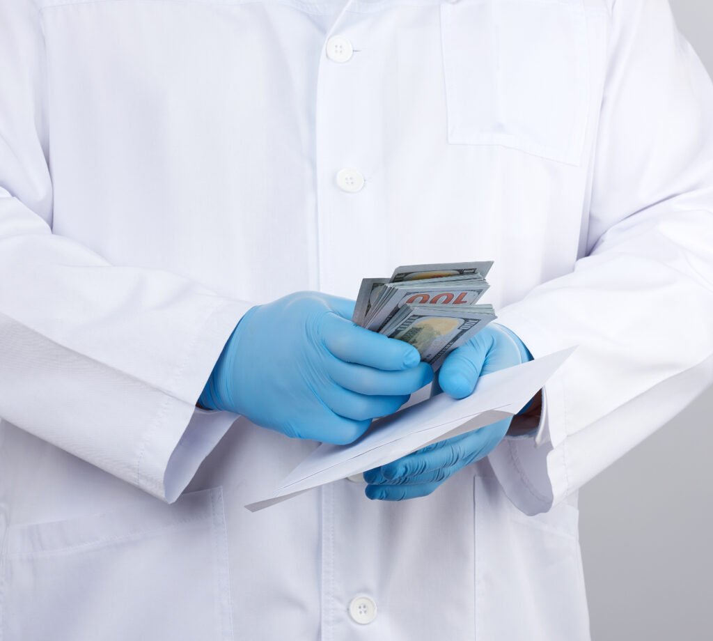 physician white coat wearing blue sterile gloves doctor holds pack paper money anti corruption concept